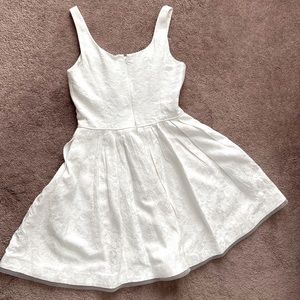 Short White Party/ Bridal Dress. Lace design. Encore by Watters. Size 10.